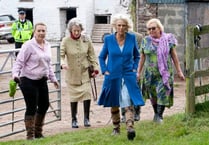 Duchess of Cornwall slips into comfy boots for farm visit