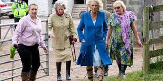 Duchess of Cornwall slips into comfy boots for farm visit
