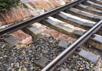 Engineeers work round the clock after floods close railway line for a week