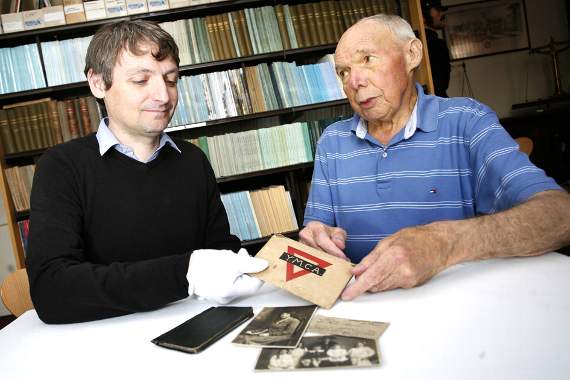 Brecknock Museum curator Nigel Blackamore with Harley Simpson.