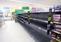 Shoppers strip shelves bare as snow stops deliveries