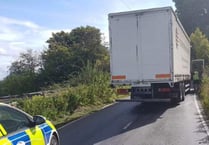 Traffic disruption after lorry crashed into wall