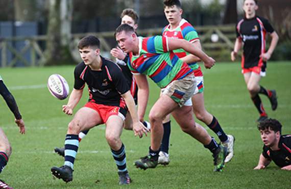 Ben Griffin is about to score a late try for Welsh Academicals to level the game against Millfield