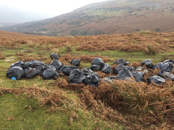 The fly-tip on Llangynidr Mountain which is suspected cannabis farm waste