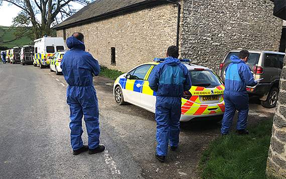 Investigators at the farmhouse in Whitton during the search for Hollie in April