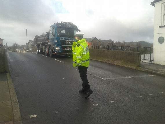 Police have been directing traffic at Llanfaes Bridge and Watergate junction in Brecon