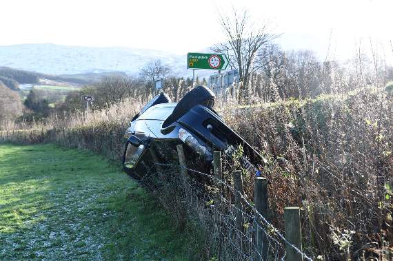 Accident at the Cross Foxes Junction where a black BMW overturned on Friday evening
