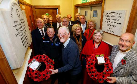 Laying the wreaths are Canon Andy Herrick and Jackie Day, with Goronwy Edwards MBE, PCSO 8191 Michala Quinn, Dylan Lewis, Edward David Davies, Mark Willliams MP, Ian Watson Smith, Martin Alexander (past president, Aberystwyth British Legion), Cllr Wendy Morris, Cllr Brenda Haines, Cllr Mair Benjamin, Enid Welsh (secretary of Nauadd Goffa) and Kevin Goodwin (chairperson, Neuadd Goffa)