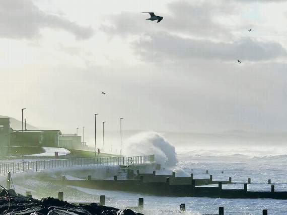 The Tywyn coastline was thrashed by large waves