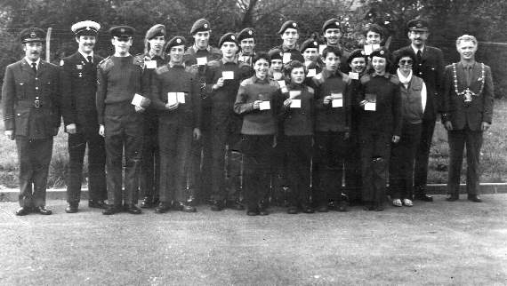 Clive Parker is pictured second from the left, wearing the uniform of the Red Cross