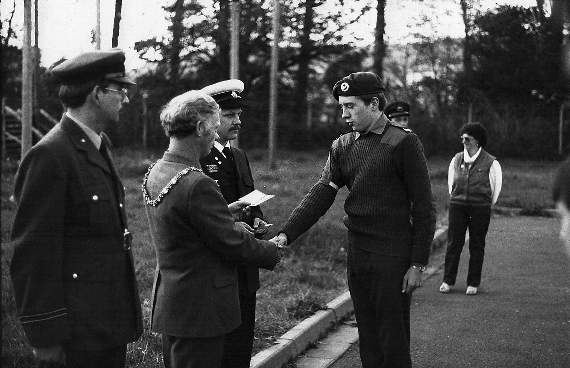 Clive and the then-mayor of Aberystwyth, Cllr T Elwyn Williams presenting Eifion Parry with his First Aid qualification