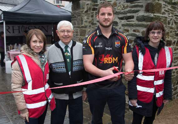 Llyr Griffiths, captain of Cardigan 1st XV rugby team, who opened the fair. With him are the mayor of Cardigan, Cllr John Adams-Lewis, and castle staff Michelle Thomas and Alyson Cole
