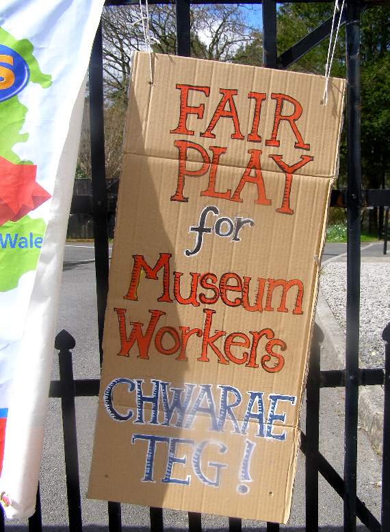 One of the protest banners erected along the picket line outside the National Wool Museum in Drefach Felindre