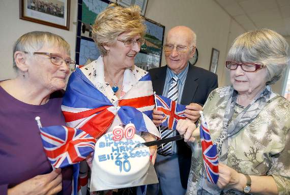 Penparcau Senior Social Club members Mair Worrall, Enid Welsh (vice-chair) and Joyce Evans with Goronwy Edwards MBE