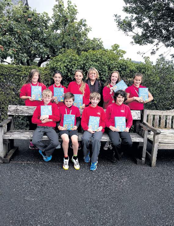 Pupils from Ysgol y Traeth, Barmouth with their dictionaries