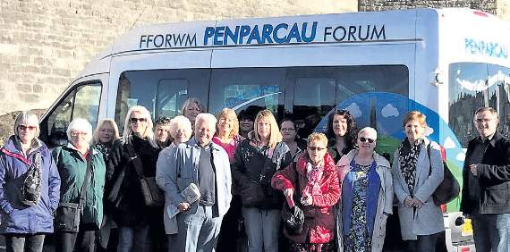 Pictured are members of Penparcau History and Heritage group visiting The Weeping Window