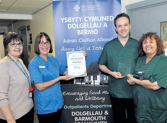 Judith Hughes, clerical officer; Anne Thomas, staff nurse; Steven Evans-Jones and Sharon Edwards, healthcare assistant. Not present for the photo was Edna Jones, clerical officer