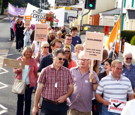 Protesters marched through Penparcau on Monday evening to oppose the closure of Bodlondeb