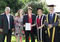 'Sad but happy' day as families pick up students’ posthumous degrees