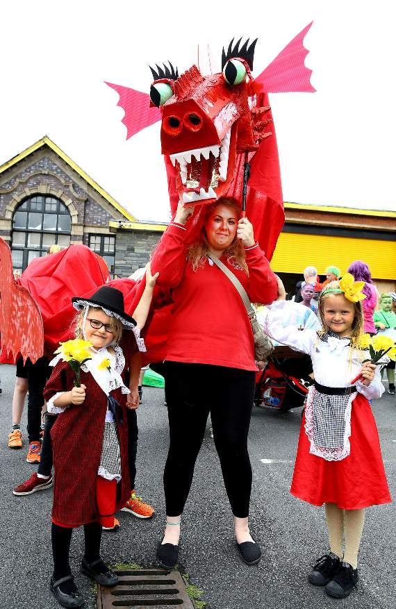 Dewi the Dragon with Joanne Jones, Mali Roberts and Libby Francis dressed in Welsh costumes