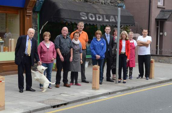 College Street shop and business owners in protest against the wooden bollards