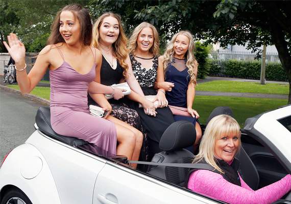 Pictured arriving in a VW Beetle driven by Hayley Revell are Mary Grice-Woods, Seren Williams-Lucas, Sioned Rimmer and Carys Hamilton