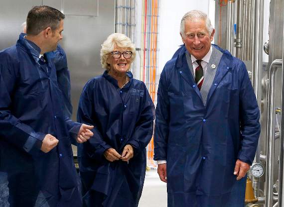 The Prince of Wales is pictured during his tour of Rachel’s Organic with Richard Cooper, factory manager and founder Rachel Rowlands