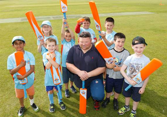 Andi Price with a few members of All Stars Cricket Club