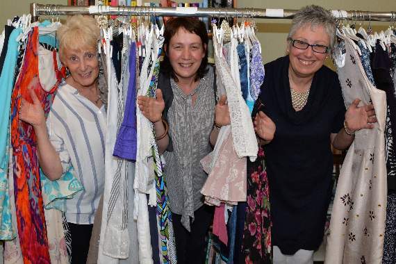 Pictured from the left: Beth Williams, Pwllheli shop manager; Sioned Williams, St David’s Hospice Dwyfor development officer and Kerrie Griffiths, store manager