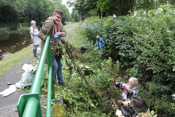 Town mayor Cllr Rhys Davies, Lowri Jones, Frances Owen, Gwyn Jones, Cllr Mair Harrison and Diana Mace clear the old leat of Himalayan balsam
