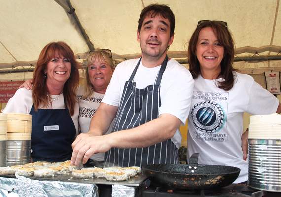 Ludo from the Harbourmaster in Aberaeron with his volunteer helpers Anne Sweeting-Jones and Debbie Fryer, and Cardigan Bay Seafood Festival organiser Menna Heulyn