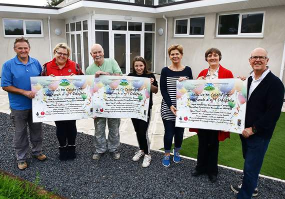 Penparcau Community Forum is inviting people to join them in celebrating the opening of the new community centre on Saturday. From left: Dylan Jones, Julie Thomas, George Barratt, Sioned Fflur, Rhian Jones, Kate Williams and Bryn Jones