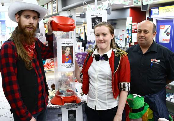 Spar staff Berwyn Roberts and Colette Thomas, with assistant manager Darren Rees at the Terrace Road store during the fundraising memorial day