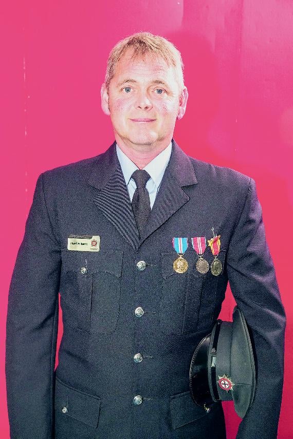 Nigel Gordon Williams received a medal for 20 years of service