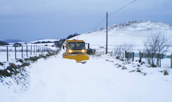 Clearing snow from our roads