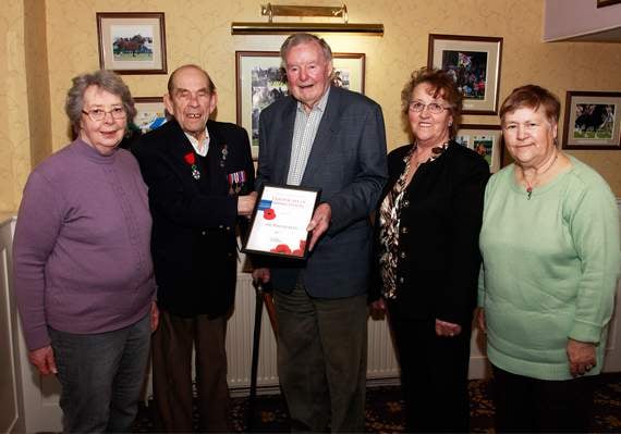 Wally receives the legion’s certificate of appreciation from Aberaeron’s branch president Martin Lewis with members, Enid Jenkins, Kate Jones and Christine Carter