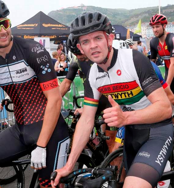 Kristian Bond of Ystwyth Cycling Club prepares for the Welsh Criterium Championships - Senior Men and Junior E1/2/3/4 race
