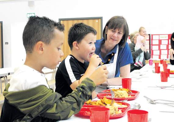 Youngsters enjoying the healthy meals