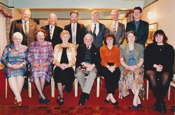 A group photograph of club members in 1996 during their book launch