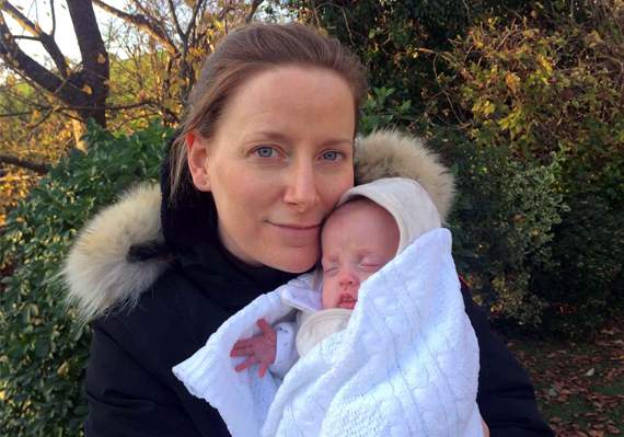 Mum Kate Edwards with baby Olivia after her return home
