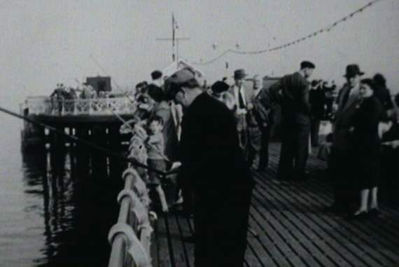 The archive contains video of early Welsh broadcasting including films at the Urdd festivals, St Davids Cathedral, Carmarthen Market and holidaymakers at Penarth