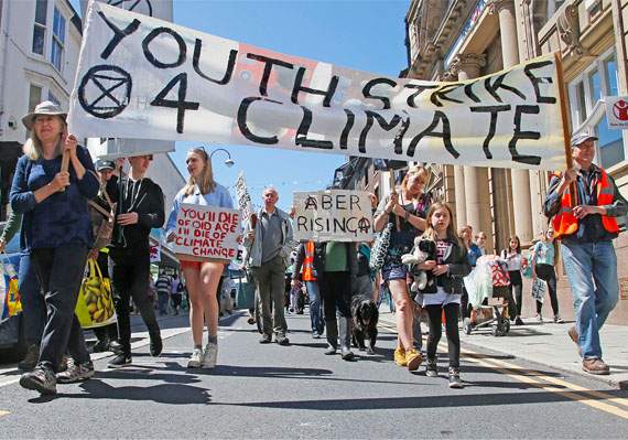 Young people from Penglais and Penweddig schools and Coleg Ceredigion gathered for the protest