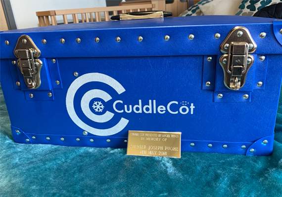 The Cuddle Cot with a plaque dedicated to the memory of Chester