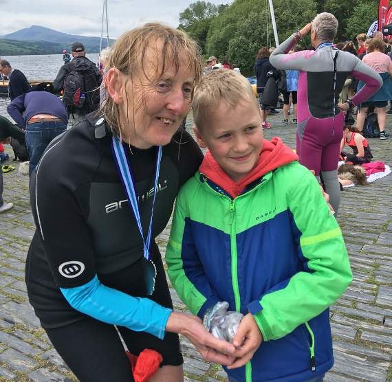 Ruth accepts a donation from Cameron who had saved up money to donate