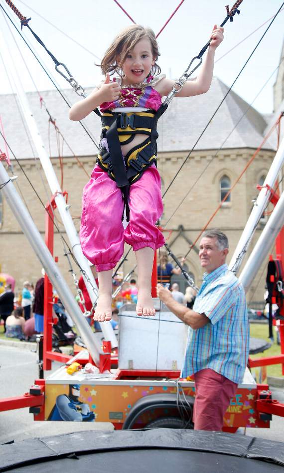 Tilly Harries, who was visiting her grandmother in Aberystwyth, having fun on the bungee trampoline