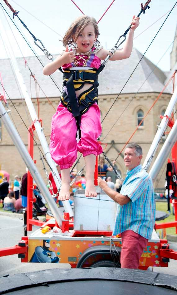 Tilly Harries, who was visiting her grandmother in Aberystwyth, having fun on the bungee trampoline
