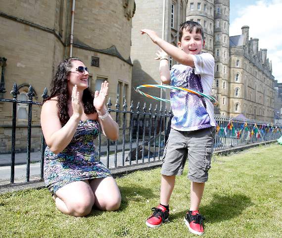 Having fun hula-hooping is six-year-old Tyler Parry with mum Leanne White, of Penuwch