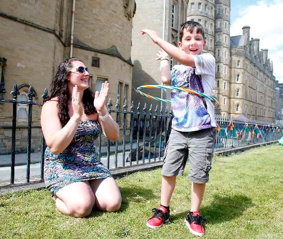 Having fun hula-hooping is six-year-old Tyler Parry with mum Leanne White, of Penuwch