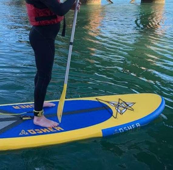10 identical O’Shea 10’6 inflatable blue and yellow stand-up paddleboards like this one were among the equipment stolen
