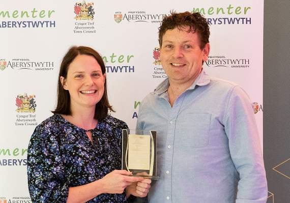Llaeth Teulu Jenkins Family Milk scooped the Green Award, sponsored by Driftwood Designs, and the Award for Promoting the Welsh Language, sponsored by Sweet Vice with Poly. Pictured are and Sara and Eifion Jenkins